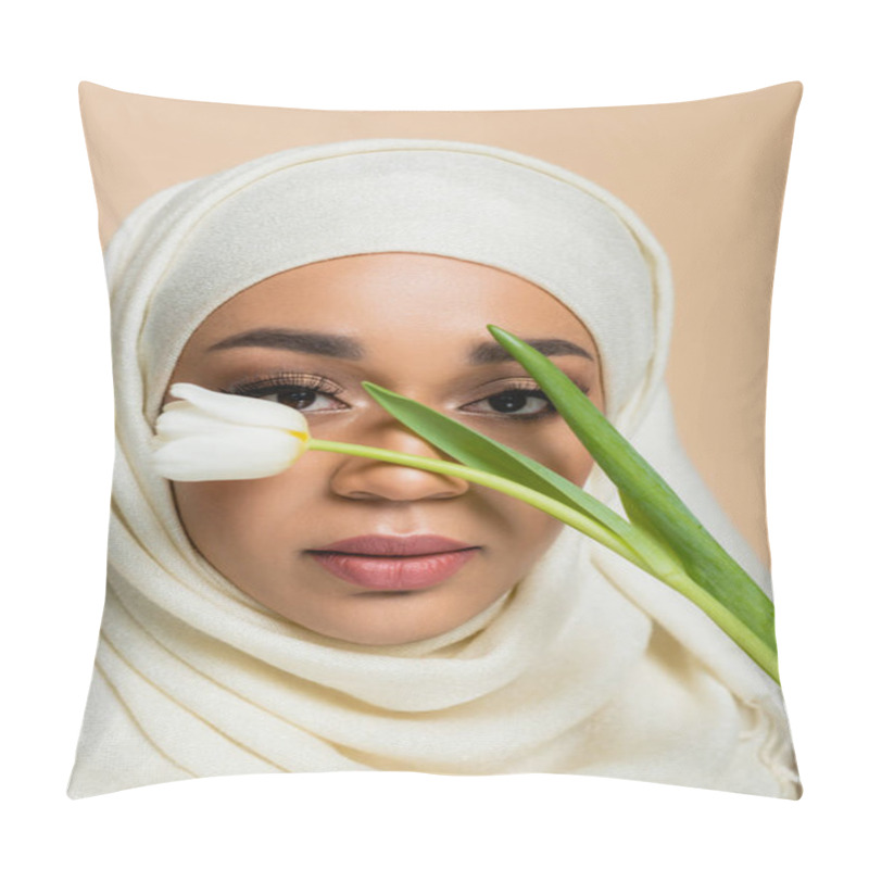 Personality  Portrait Of Pretty Muslim Woman In Hijab Looking At Camera Through Tulip Isolated On Beige Pillow Covers