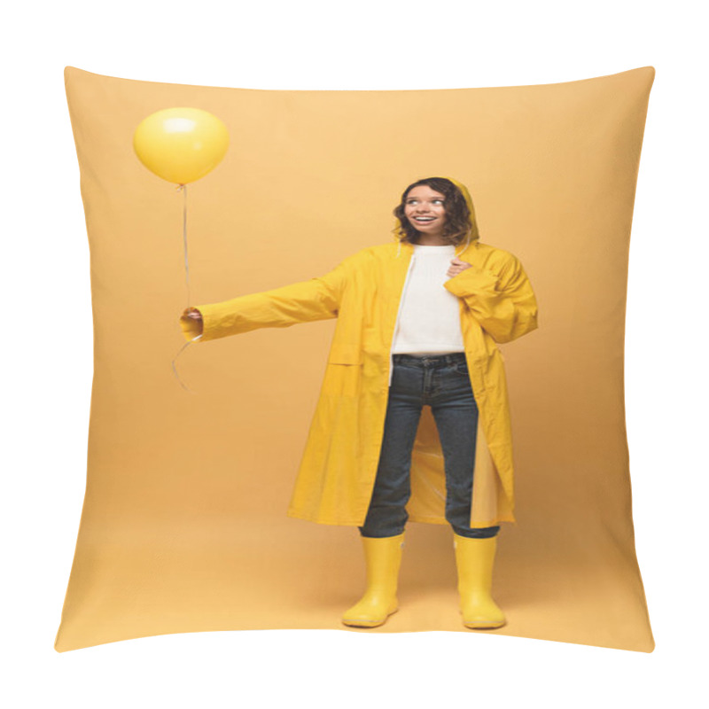 Personality  Happy Curly Woman In Yellow Raincoat And Wellies Holding Balloon On Yellow Background Pillow Covers