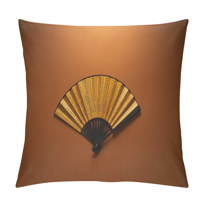 Personality  Top View Of Decorative Black And Golden Fan With Hieroglyphs On Brown Background, Chinese New Year Concept Pillow Covers