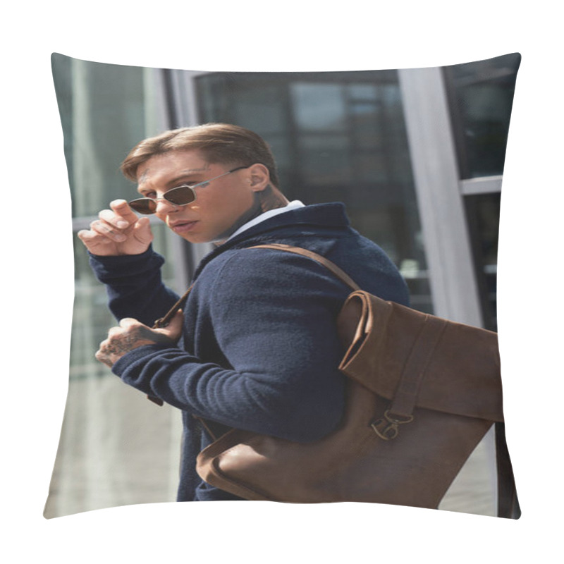 Personality  Handsome Young Man Adjusts His Sunglasses While Carrying A Brown Bag In A Modern Setting. Pillow Covers