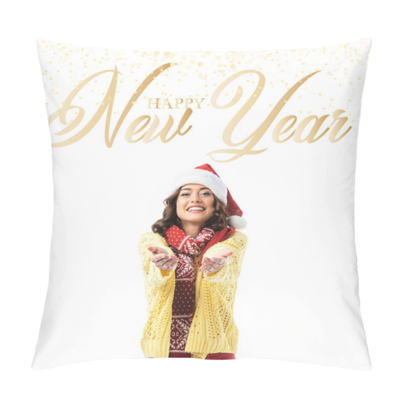 Personality  Joyful Young Woman In Santa Hat And Scarf Standing With Outstretched Hands Near Happy New Year Lettering On White Pillow Covers