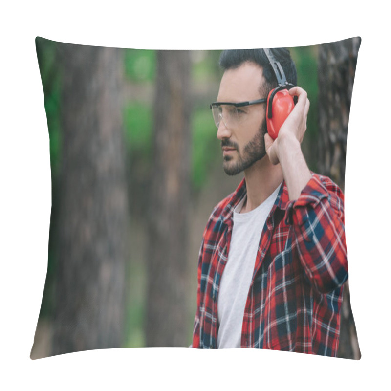 Personality  Pensive Lumberjack Touching Noise-canceling Headphones And Looking Away In Forest Pillow Covers