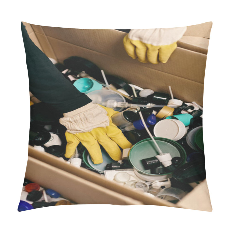 Personality  A Young Volunteer In Gloves And A Safety Vest, Sorting Through A Box Filled With A Wide Variety Of Items. Pillow Covers