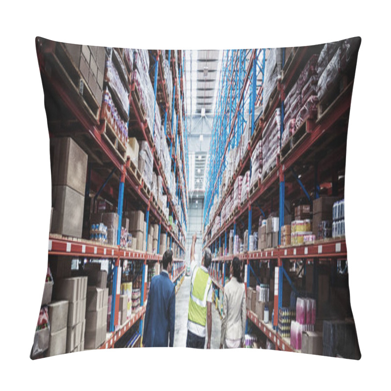 Personality  Rear View Of Warehouse Team Discussing While Walking In Warehouse Pillow Covers