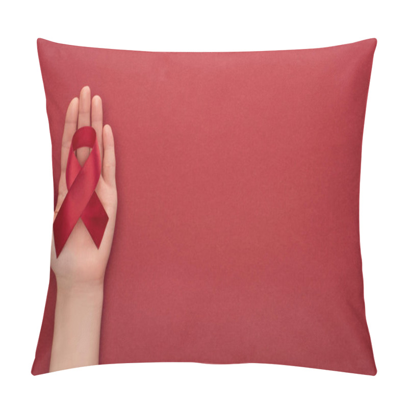 Personality  Cropped View Of Woman Holding Red Awareness Aids Ribbon On Red Background Pillow Covers