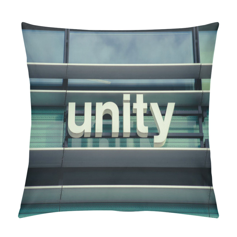 Personality  Vilnius, Lithuania - November 9, 2022: Unity Logo On The Office Building. Unity Technologies Is An American Video Game Software Development Company. Pillow Covers