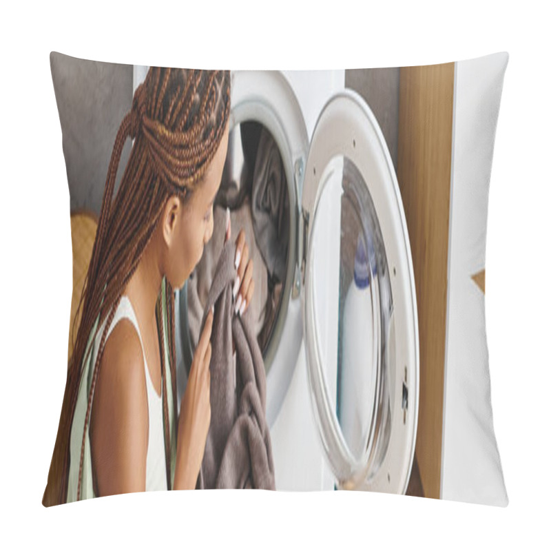 Personality  An African American Woman With Afro Braids Gazes At Her Reflection In A Mirror While Doing Laundry In A Bathroom. Pillow Covers