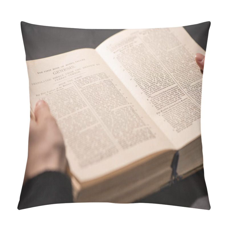 Personality  KYIV, UKRAINE - JANUARY 17, 2020: Cropped View Of Woman Reading Holy Bible In Dark With Sunlight Pillow Covers