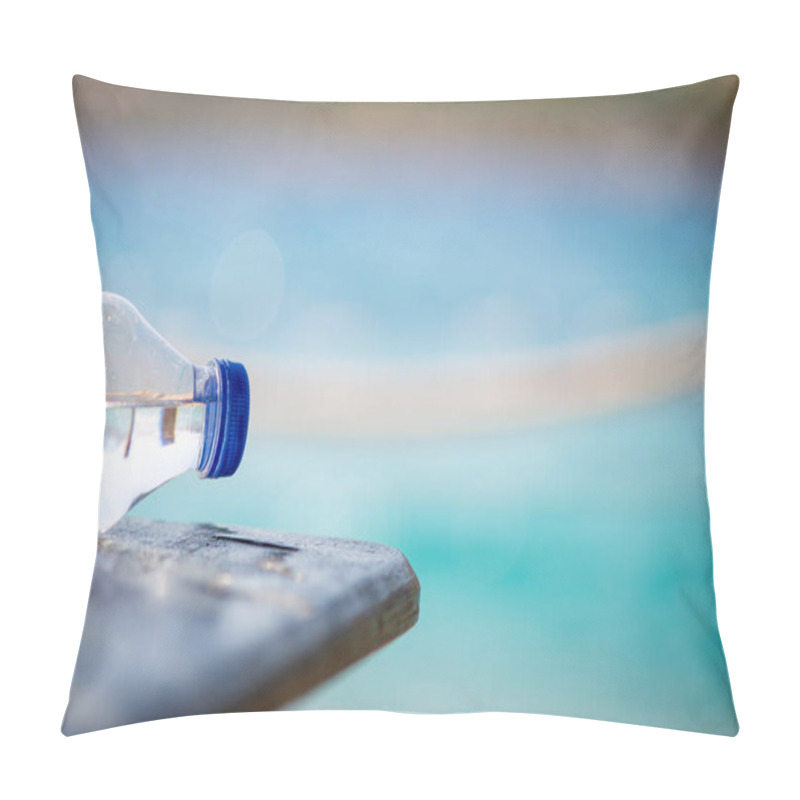 Personality  A Poignant Image Of A Plastic Bottle Resting On The Shoreline, Highlighting The Impact Of Pollution In Beautiful Coastal Surroundings. Pillow Covers