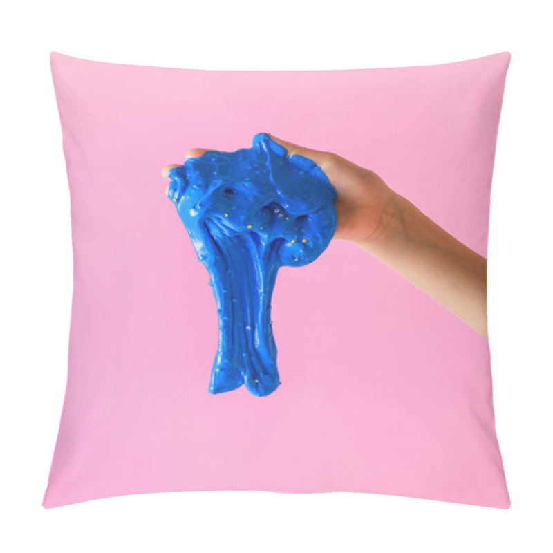 Personality  Blue Slime Falls From The Hands Of A Child On A Pink Background. Toy Antistress. Toy For The Development Of Hand Motor Skills. Pillow Covers