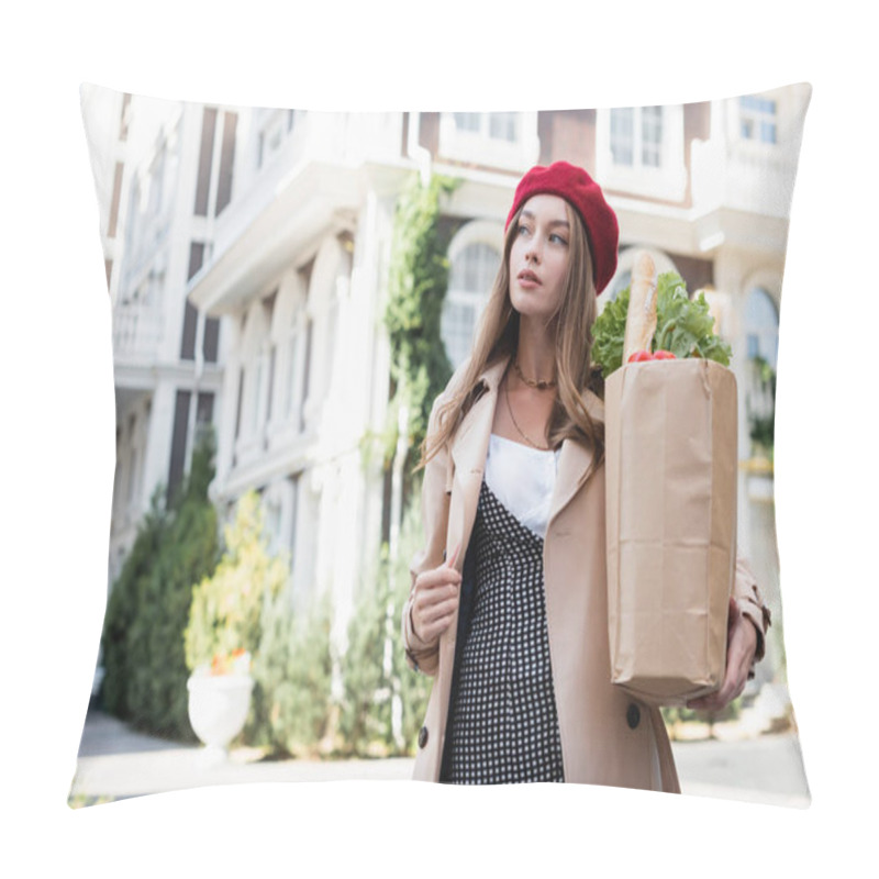 Personality  Young Woman In Beige Trench Coat And Red Beret Holding Paper Bag With Groceries On Urban Street  Pillow Covers