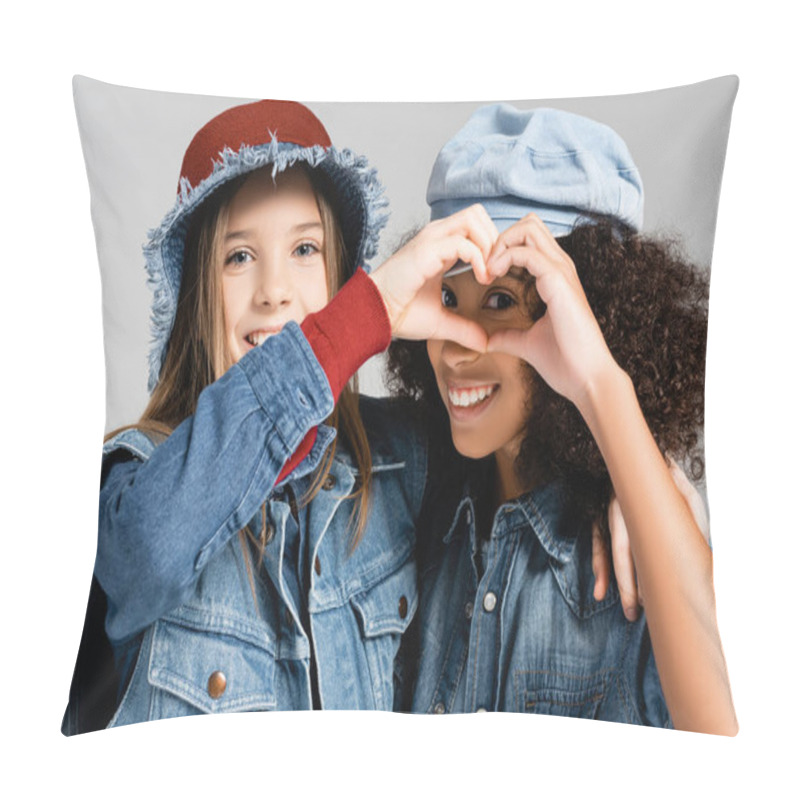 Personality  Happy Multicultural Girls In Denim Clothes And Hats Showing Heart Symbol With Hands Isolated On Grey Pillow Covers