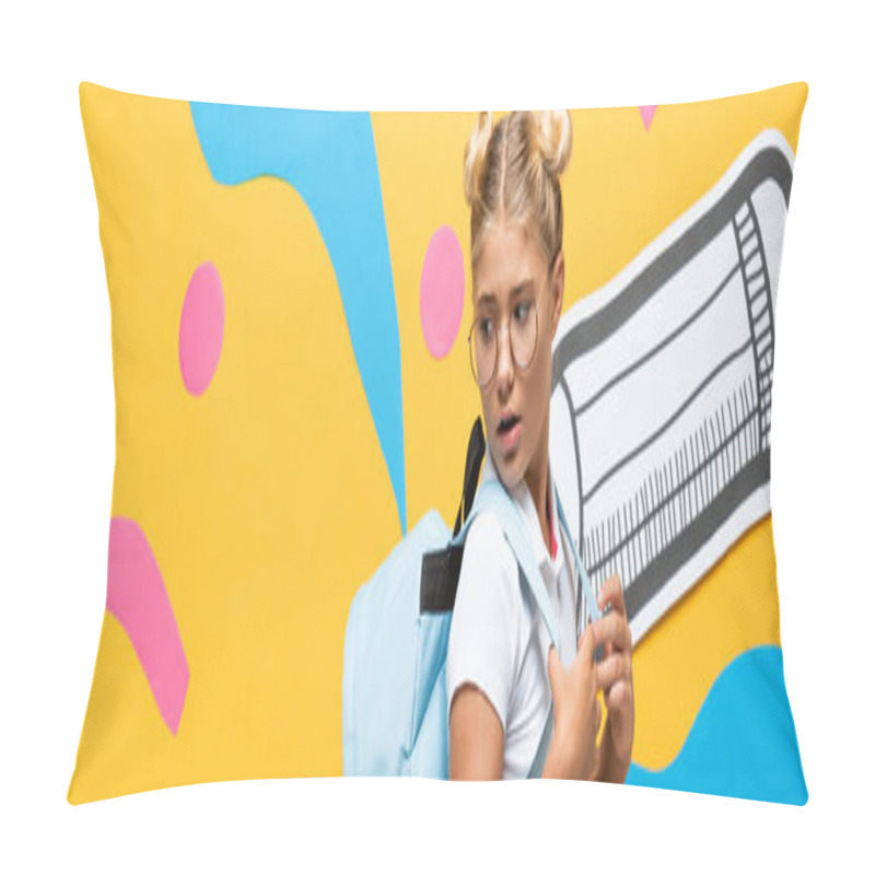 Personality  Horizontal Image Of Surprised Schoolkid Looking At Backpack Near Paper Pencil And Decorative Elements On Yellow Pillow Covers