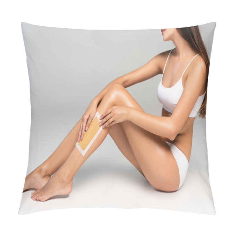 Personality  Cropped View Of Young Adult Woman In White Underwear Applying Wax Stripe On Leg On Grey Pillow Covers