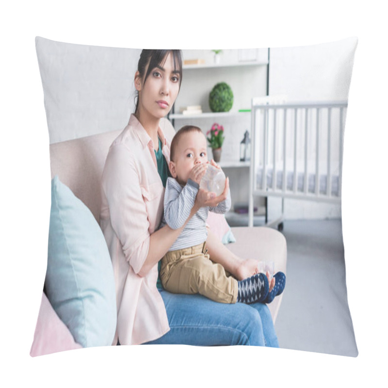 Personality  Young Beautiful Mother Feeding Her Little Child With Bottle At Home And Looking At Camera Pillow Covers