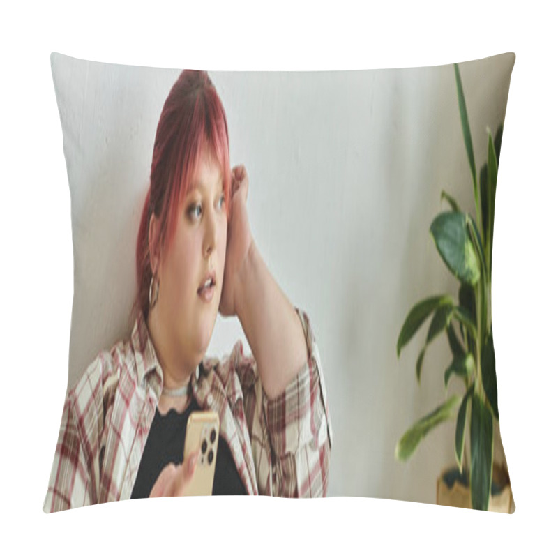 Personality  A Woman With Pink Hair Relaxes In Her Home, Thoughtfully Scrolling Through Her Phone. Pillow Covers