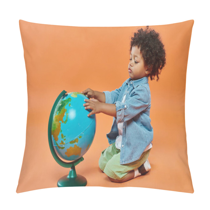 Personality  Happy African American Toddler Boy In Casual Attire Touching Globe And Sitting On Orange Backdrop Pillow Covers