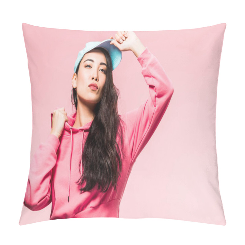 Personality  Attractive And Pensive Asian Woman In Pink Pullover And Cap Looking Away Isolated On Pink  Pillow Covers