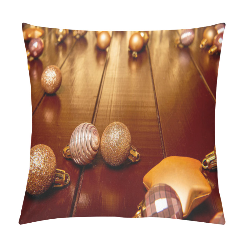 Personality  Collection Of Sparkling Gold And Pink Christmas Ornaments Scattered On A Wooden Floor, With A Golden Backdrop And Festive Ambiance. Greeting Postcard. Copy Space Pillow Covers