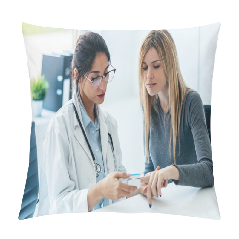 Personality  Shot Of Beautiful Female Doctor Measuring Heart And Blood Pressure While Taking Care To Young Patient In The Medical Consultation Pillow Covers