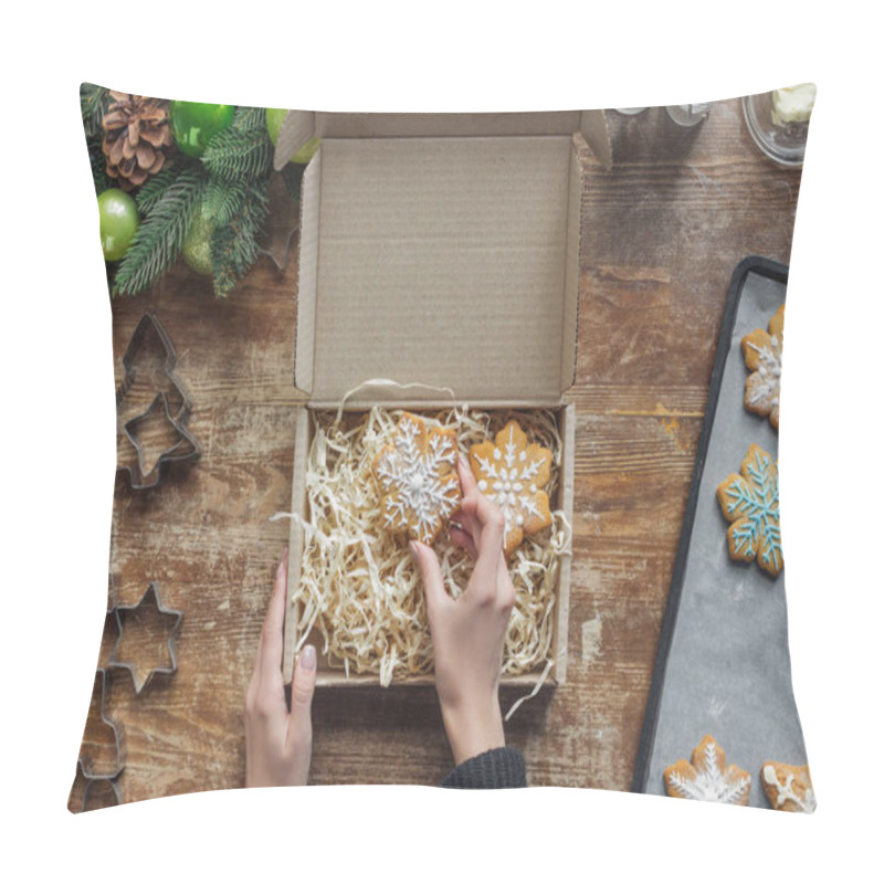 Personality  Cropped Shot Of Woman Putting Homemade Christmas Cookie In Box On Wooden Tabletop With Decorative Christmas Wreath Pillow Covers