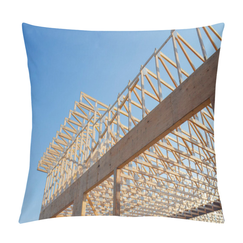 Personality  A House Under Construction With A Wooden Roof Frame And Trusses, Showcasing Architectural Design And Structural Framework Against A Vibrant Blue Sky. Pillow Covers