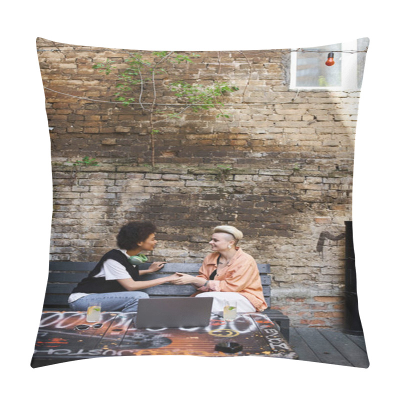 Personality  A Diverse Couple Of Lesbians Engaged In Conversation On A Bench In A Cafe. Pillow Covers