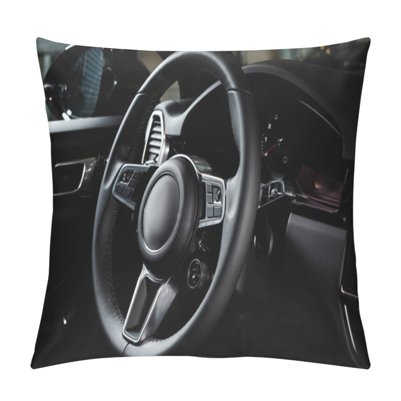 Personality  KYIV, UKRAINE - OCTOBER 7, 2019: Close Up Of Black Steering Wheel In Modern Porshe Pillow Covers