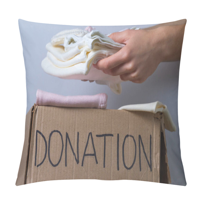 Personality  Donation Concept. Donation Box With Donation Clothes On A Table. Charity. Helping Poor And Needy People Pillow Covers