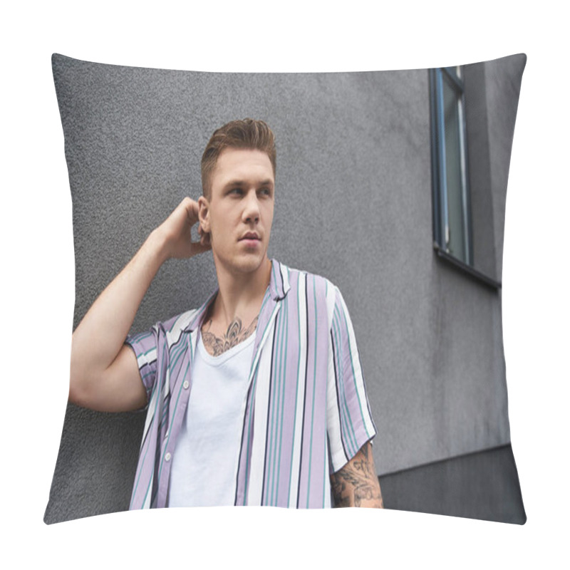 Personality  Young Man With Tattoos Poses Confidently Next To A Textured Gray Wall. Pillow Covers