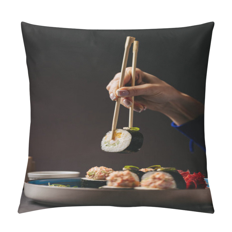 Personality  Hand Holding Sushi Roll With Chopsticks, Showcasing Fresh Ingredients Of Cucumber And Crab. High Quality Photo Pillow Covers