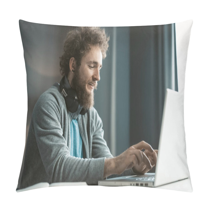 Personality  Young Freelancer Man Working At Laptop Sitting At The Desk At Home Office And Making Notes Or Programming As IT Specialist. Remote Working Handsome Young Man Working At Home. Work From Home Concept Pillow Covers