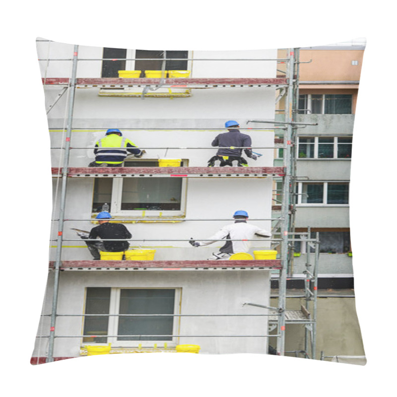 Personality  Four Workers Apply Decorative Plaster To The Facade Of The Apartment House To Be Renovated Pillow Covers