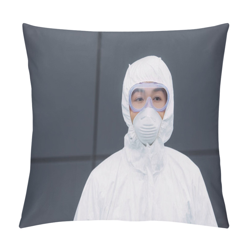 Personality  Asian Epidemiologist In Hazmat Suit And Respirator Mask Looking Away While Standing Near Wall Of Building Pillow Covers