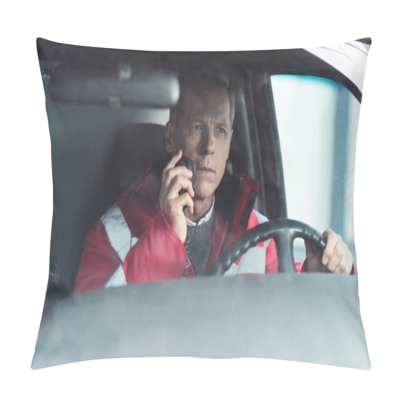 Personality  Serious Paramedic Sitting In Ambulance On Driver Seat And Talking By Portable Radio Pillow Covers