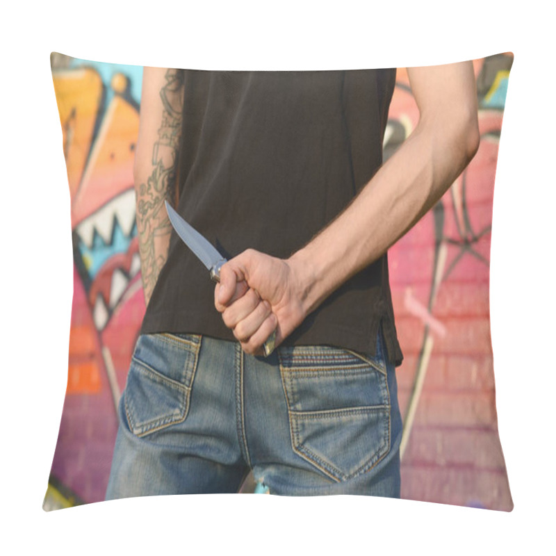 Personality  Back View Of Young Caucasian Man With Knife In His Hand Against Ghetto Brick Wall With Graffiti Paintings. Concept Of Criminal Forces And Aggression Charge. Classic Killers Melee Weapon Pillow Covers