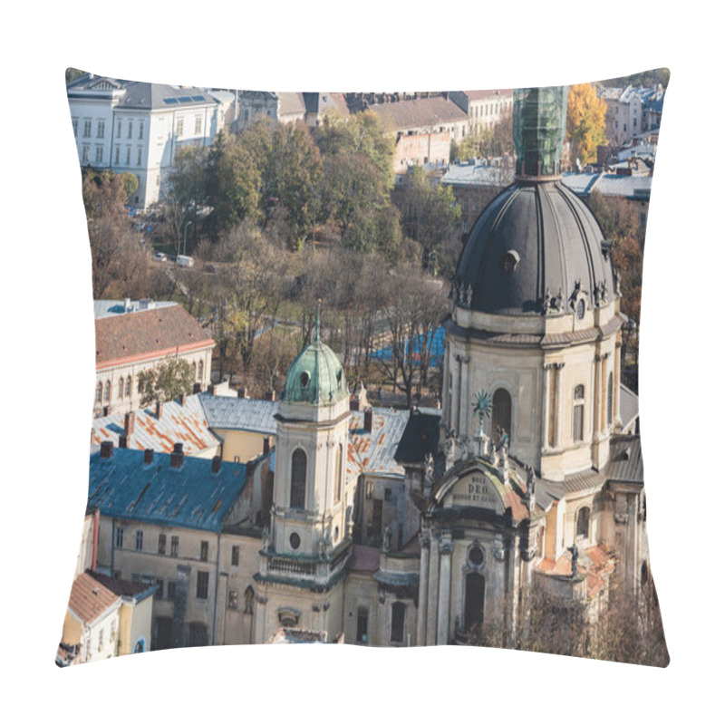 Personality  LVIV, UKRAINE - OCTOBER 23, 2019: Aerial View Of Dominican Church With Latin Lettering, Surrounded By Green Trees Pillow Covers