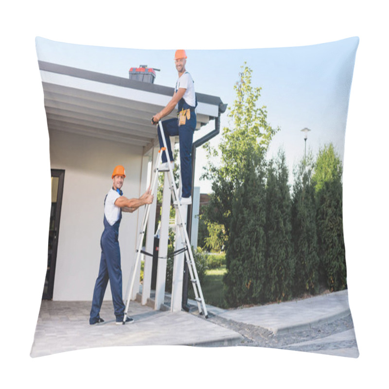 Personality  Builders In Uniform Using Ladder Near Building Outdoors Pillow Covers