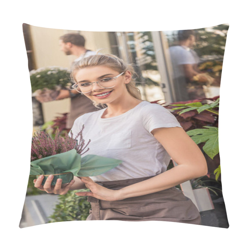 Personality  Beautiful Florist Holding Potted Plant Near Flower Shop And Looking At Camera Pillow Covers