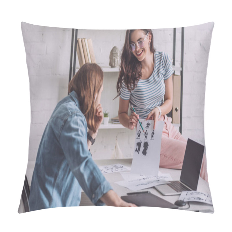 Personality  Selective Focus Of Happy Illustrator Holding Cartoon Sketches Near Man Pillow Covers