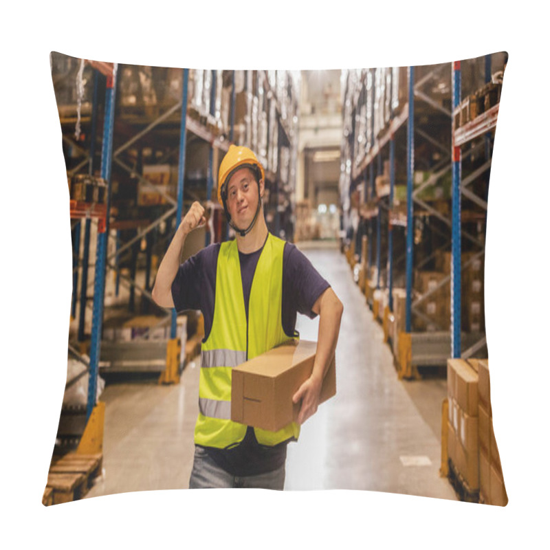 Personality  A Confident Warehouse Worker With Down Syndrome Flexing His Arm While Carrying A Box In A Busy Warehouse. Pillow Covers