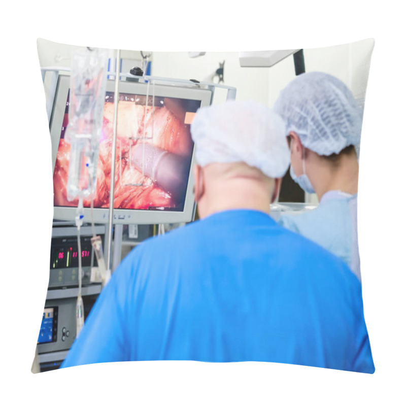 Personality  A Group Of Surgeons In A Medical Uniform Oversees Medical Equipment. The Process Of Performing A Surgical Operation Using A Modern Robotic Surgical System. Pillow Covers