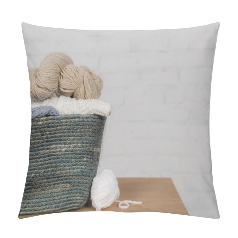 Personality  Basket With Woolen Yarns On Wooden Table Near White Brick Wall Pillow Covers