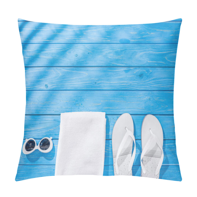 Personality  Top View Of White Folded Towel, Retro Sunglasses And Flip Flops On Blue Wooden Background With Shadows And Copy Space Pillow Covers