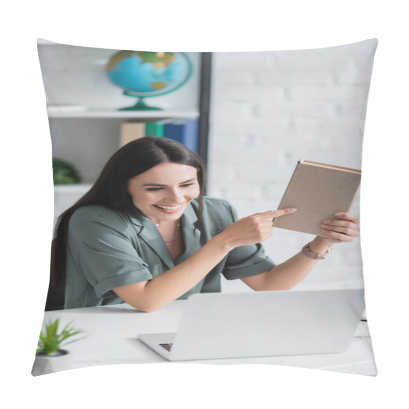 Personality  Positive Teacher Pointing At Book During Video Call On Laptop In School  Pillow Covers