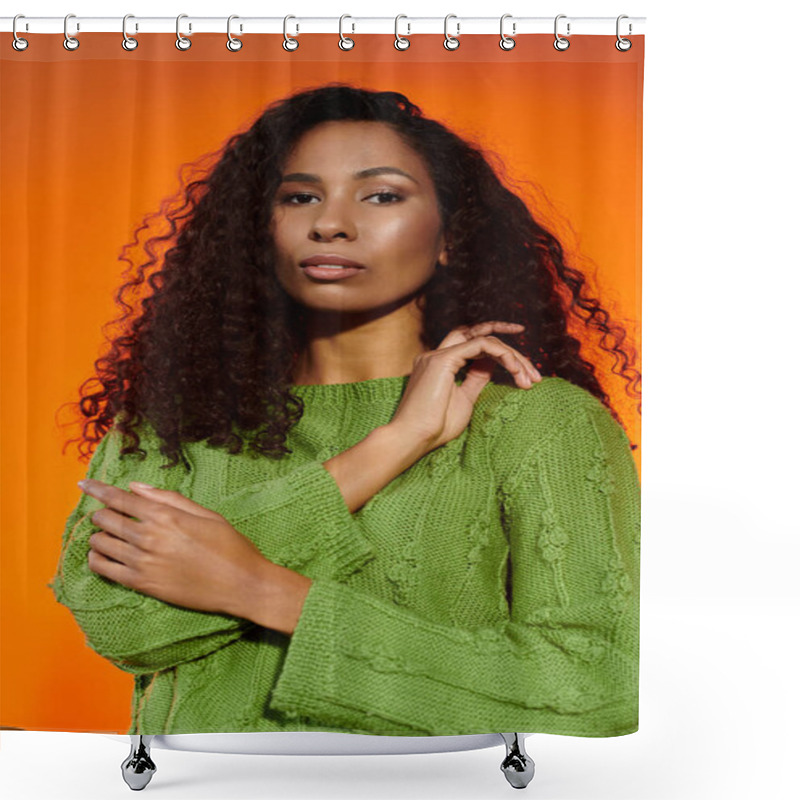 Personality  Curly Haired Woman In A Green Sweater Poses Against A Glowing Orange Background. Shower Curtains