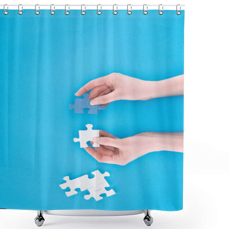 Personality  Cropped Image Of Businesswoman Assembling Blue And White Puzzles Isolated On Blue, Business Concept Shower Curtains