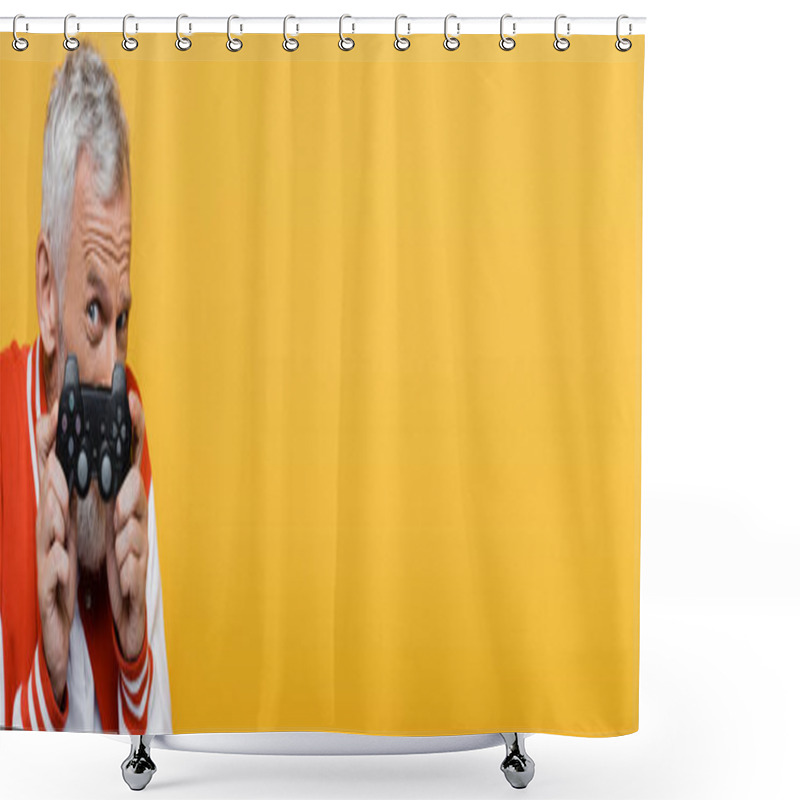 Personality  KYIV, UKRAINE - JULY 29, 2021: Middle Aged Man In Bomber Jacket Covering Face With Joystick Isolated On Yellow, Banner Shower Curtains