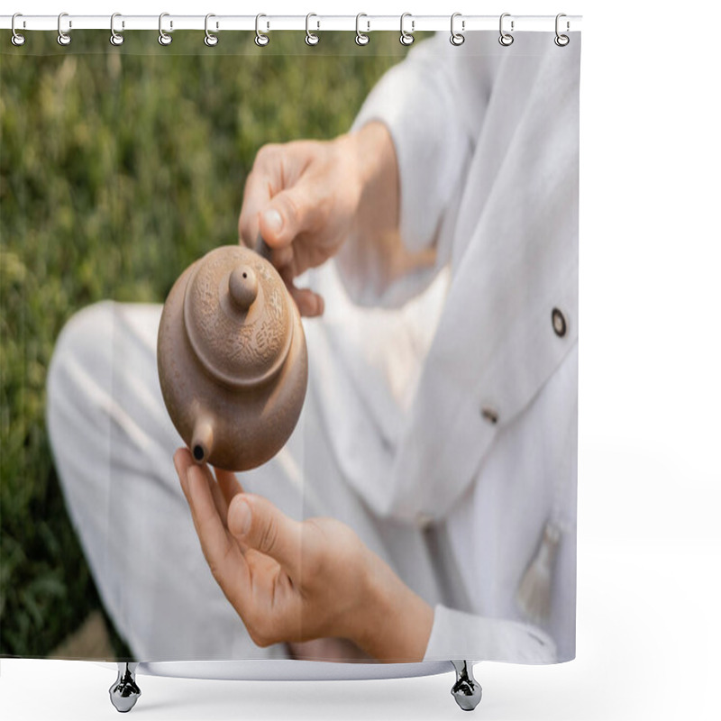 Personality  Cropped View Of Man In White Linen Clothes Holding Clay Teapot While Sitting Outdoors Shower Curtains