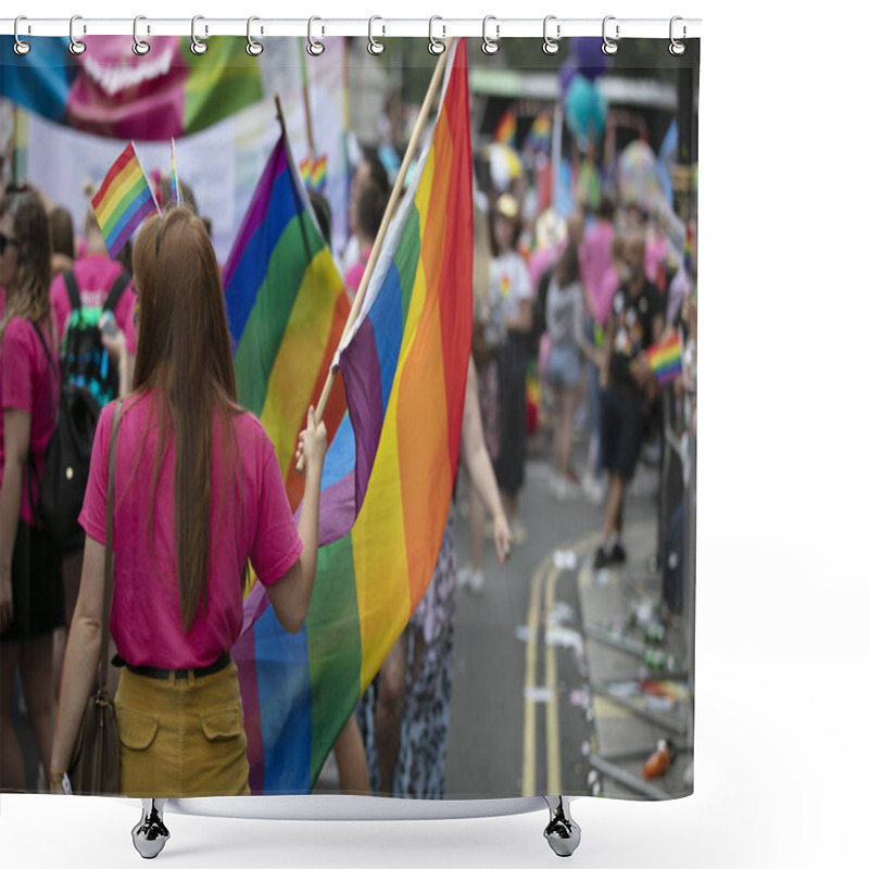 Personality  LONDON, UK - July 6th 2019: People Wave LGBTQ Gay Pride Flags At A Solidarity March Shower Curtains